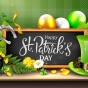Graphic that says Happy St. Patricks Day with a pot of gold, green balloons, and a green top hat. 