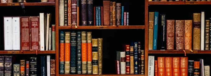 close up photo of old books on bookshelf.