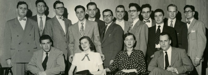 This is a group photo of the first Buffalo Law Review editorial board (1951-52). The Law Review's inaugural issue was published by a group of law students under the guidance of Professor Charles W. Webster. The issue was 350 pages and had an initial run of 100 copies without having any subscribers. The lead article in Volume 1 was written by Charles S. Desmond who was then an Associate Judge on the New York Court of Appeals and would later become the Chief Judge of New York's highest court. 