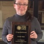 Sarah Hicks '17 showing off her award. She was the recipient of the Center for Elder Law & Justice's Student Volunteer of the Year Award. 