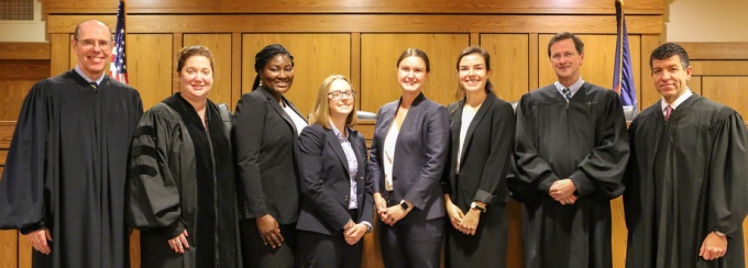 Judges and finalists at the 2018 Charles S. Desmond Moot Court Competition (left to right): Hon. Eugene M. Fahey ‘88, Dean Aviva Abramovsky, Destiny M. Johnson ’20, Chloe J. Nowak ’20, Hannah Rauh ’20, Meghan M. Carrig ’20, Hon. Jeremiah J. McCarthy and Hon. Emilio Colaiacovo ’01. 
