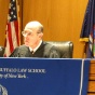 Justice Fahey sitting at a court bench. 