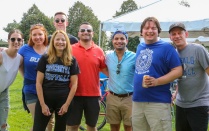 photo of law faculty and students attending a tailgate party. 