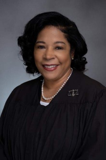 woman smiling.