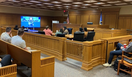 students in a courtroom.