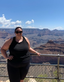 Emily standing at an overlook of the Grand Canyon. 