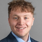 young man smiling. 