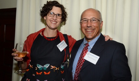 man and woman smiling. 