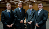 photo of law graduate smiling. 