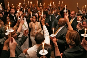 photo of candle ceremony at the students of color dinner. 