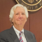Picture of Peter Dellinger with members of the Community Engagement Law Clinic. 
