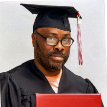Graduation Photo of John Moore. 