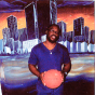 Photo of John Moore Holding Basketball. 