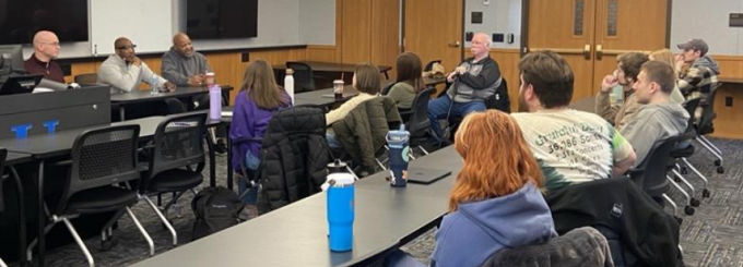 George Schreier, Thomas Gant, and Walter Ball , speaking with student attorneys in a Criminal Justice Advocacy Clinic class in 2025. 