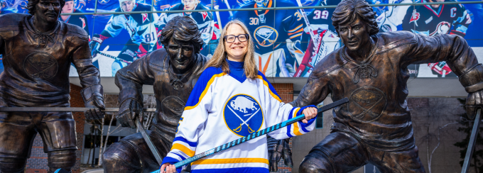A portrait of Helen “Nellie” Drew, with the School of Law and former in-house counsel for the Buffalo Sabres, photographed in March 2025 at KeyBank Arena. Photographer: Douglas Levere. 