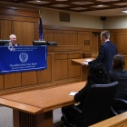 student in courtroom during a moot court competition. 