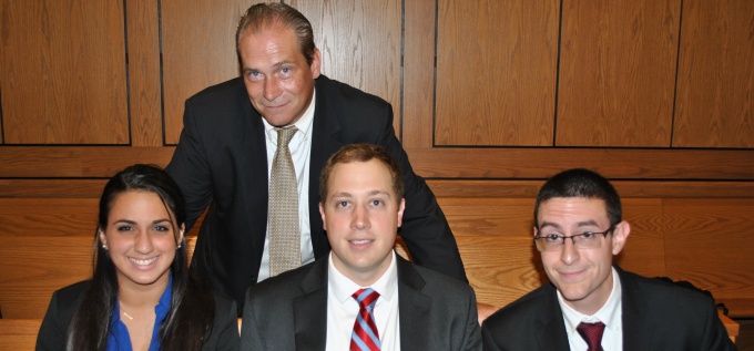 Alexandra Cusano '16, John Ewell '16, Seth Hiser '16, (standing) Coach Matthew Murray. 