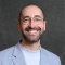 Headshot of the Senior Coordinator of Experiential Education, Daniel Ortega.