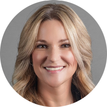 young woman, smiling.