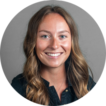 young woman, smiling.