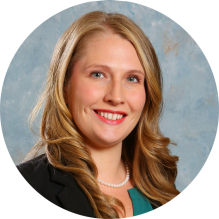 young woman smiling.