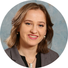 young woman smiling.