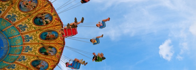 Photo of people on a carnival ride. 