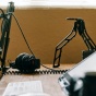 photo of computer desk with microphone and computer. 