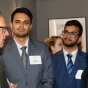 Four people conversing at the NYC Program in Law and Finance reception. 