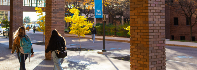 Students walking on UB's campus. 