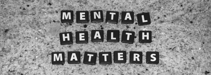 Close up image of black and white letters spelling out Mental Health Matters. 