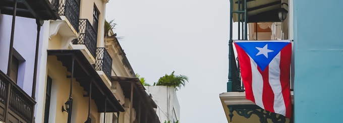 Puerto Rican flag hanging from a balcony in Old San Juan, Puerto Rico. 