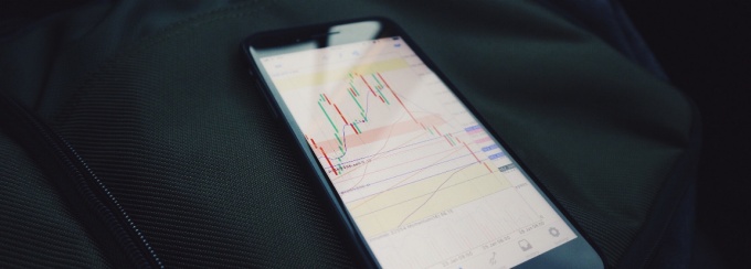 A photo with graph displayed on a phone screen. 