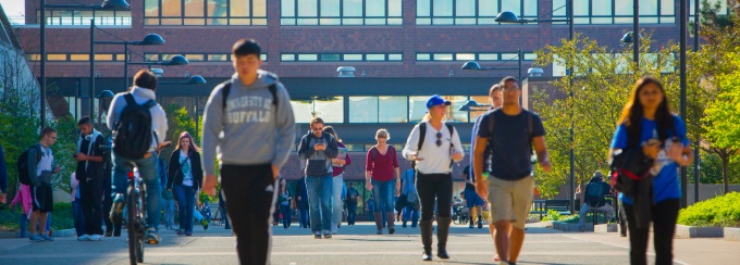 Students walking the academic spine of UB North Campus. 