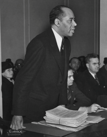 Charles Hamilton Houston speaks at an unidentified government hearing in Washington, D.C. circa 1940. 