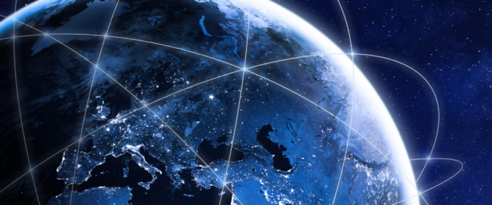 Illustration of Earth viewed from space with illuminated network lines connecting regions across Europe, Asia, and Africa, symbolizing global communication and connectivity. 