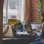 Photo of girl studying in a coffee shop. 
