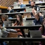 UB Law students in a lecture hall during class. 
