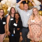 group of diverse students, smiling. 