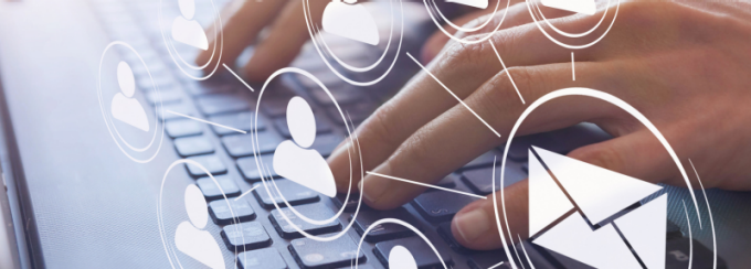 Hands typing on a laptop keyboard with digital icons overlaid, including multiple user profile symbols connected by lines and a large envelope icon, representing email communication and networking. 