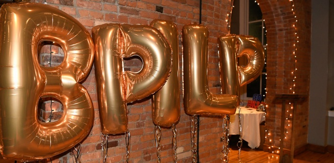 festive balloon letters that spell out BPILP. 