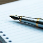 photo of pen on paper. 