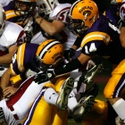 photo of football players in a game. 