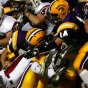 photo of football players in a game. 