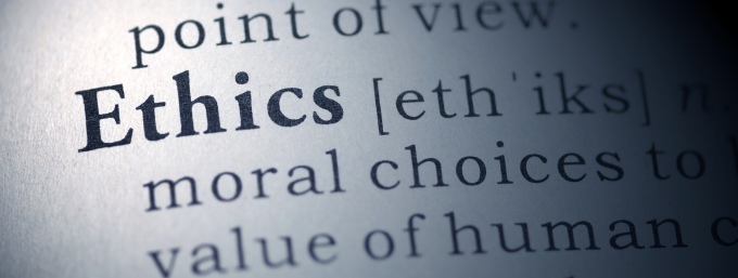a closeup of a book showing the text for the definition of the word Ethics. 