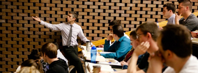 law faculty teaching a classroom of students. 