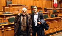 Zoom image: Gardner with Dr. Thomas Fleiner, professor at the University of Brig, visiting the National Council&rsquo;s chamber in Vienna, Austria. 