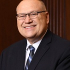 Dan Lukasik standing in a courtroom. 