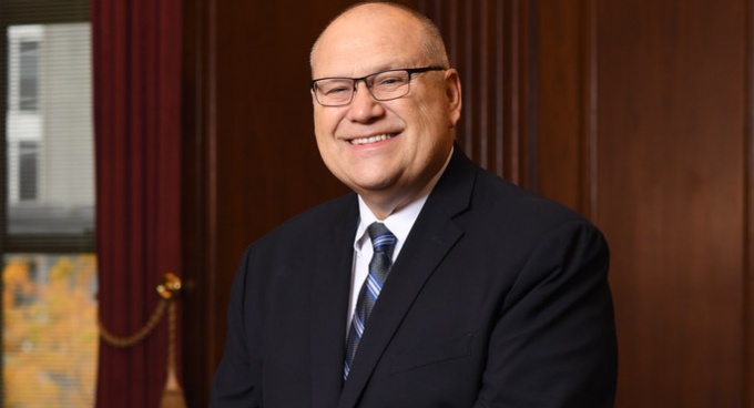 Dan Lukasik standing in a courtroom. 