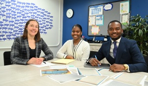 Zoom image: Associate Professor and Director of the Civil Rights and Transparency Clinic Heather Abraham with student attorneys Khalia Muir ’26 and Chris Fynn ’25. 